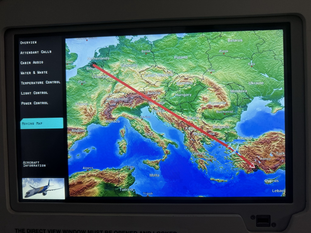Screen with flight information in the airplane from Antwerp
