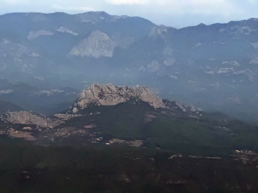 Mountains at the north side of the city, viewed from the airplane from Antwerp, at sunset