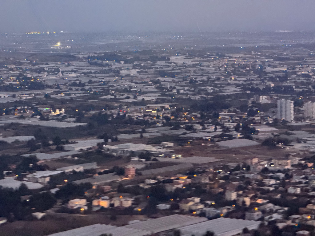 Greenhouses at the northeast side of the city, viewed from the airplane from Antwerp, at sunset