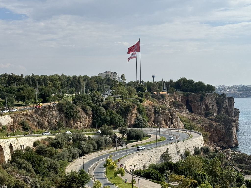 The Konyaalti Plaji road and flags, viewed from the path at the top of the elevator from the Atatürk Kültür Park to the Beach Park