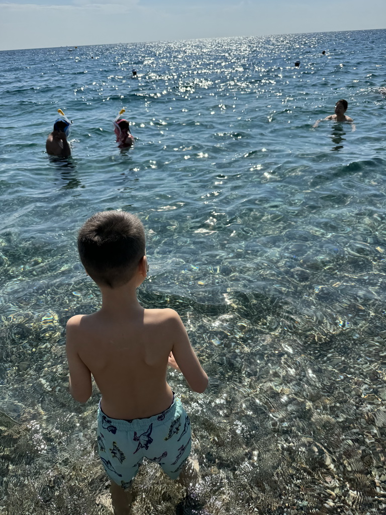 Max at the beach at the Beach Park, with a view on the Gulf of Antalya