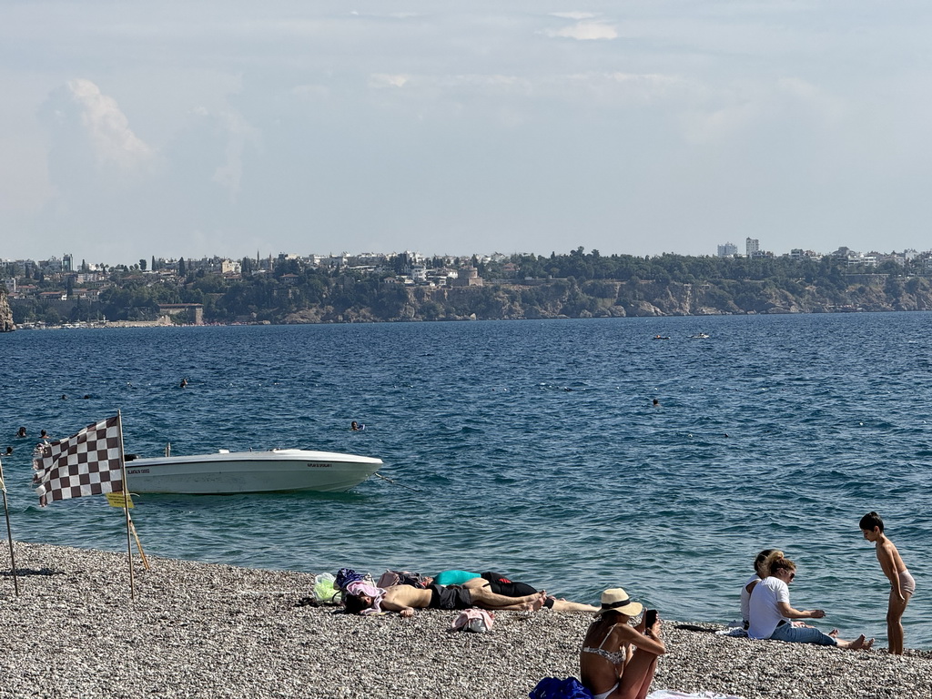 Beach at the Beach Park, the city center and the Gulf of Antalya