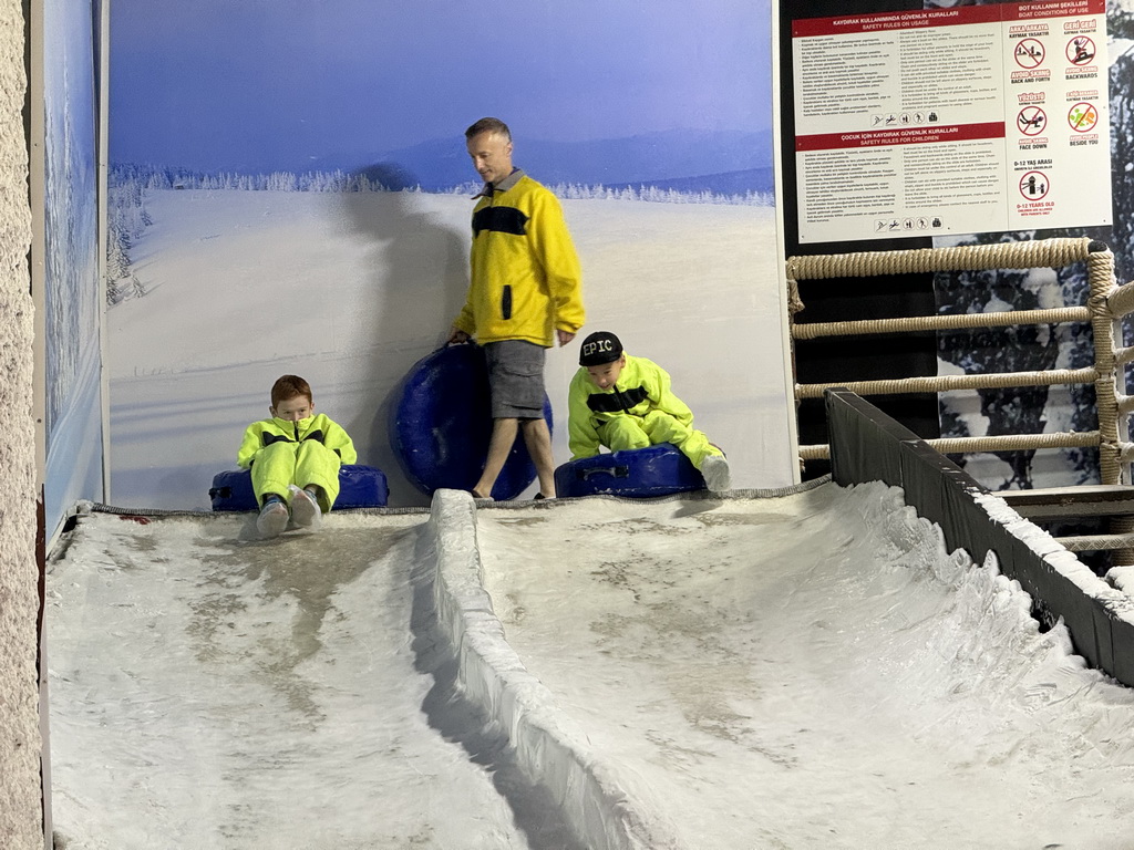 Max and other people with tyres at the Snow World at the Antalya Aquarium