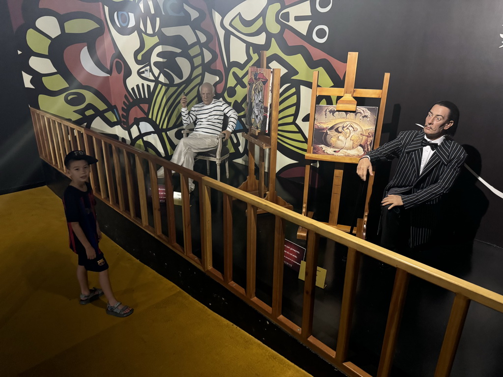 Max with statues of Pablo Picasso and Salvador Dalí at the Face 2 Face Wax Museum at the Antalya Aquarium, with explanation