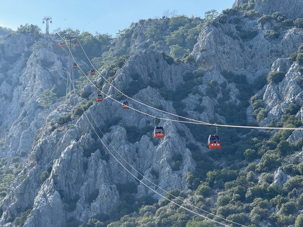 The Tünektepe Teleferik Tesisleri cable car at the Tünek Tepe hill, viewed from the parking lot at the Antalya Kemer Yolu road