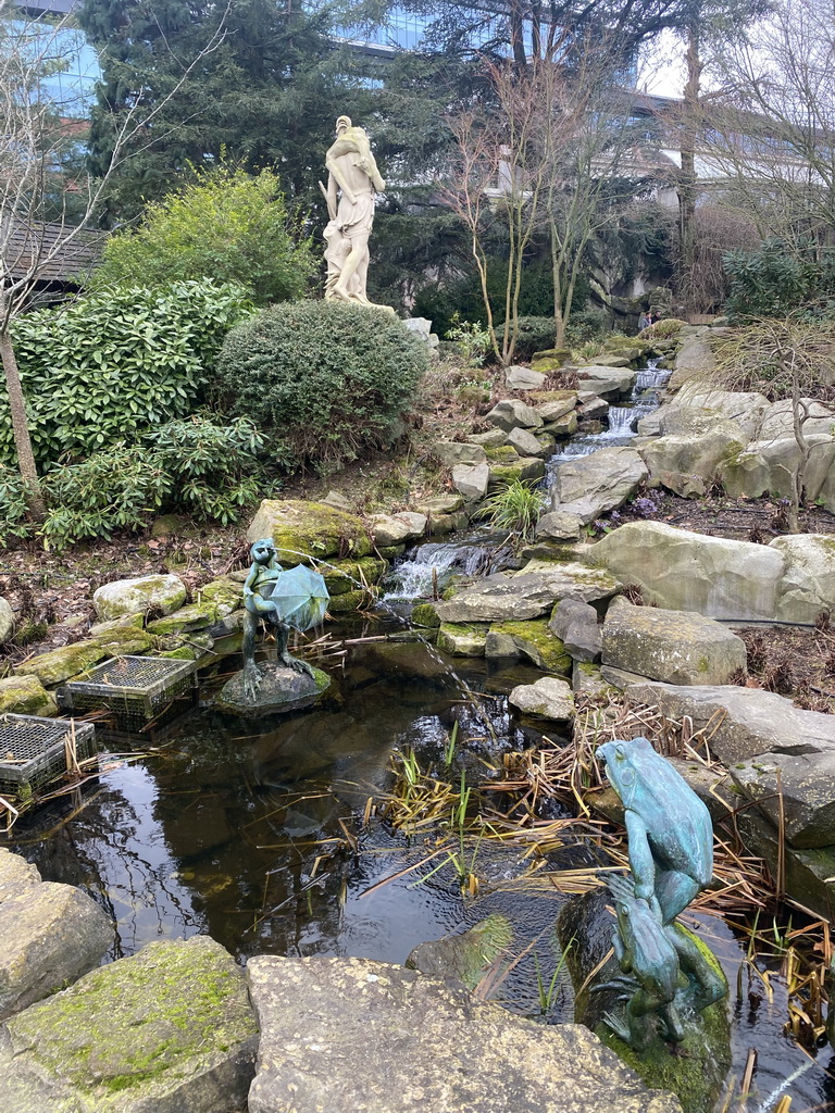 Statue, fountain and waterfall at the Antwerp Zoo