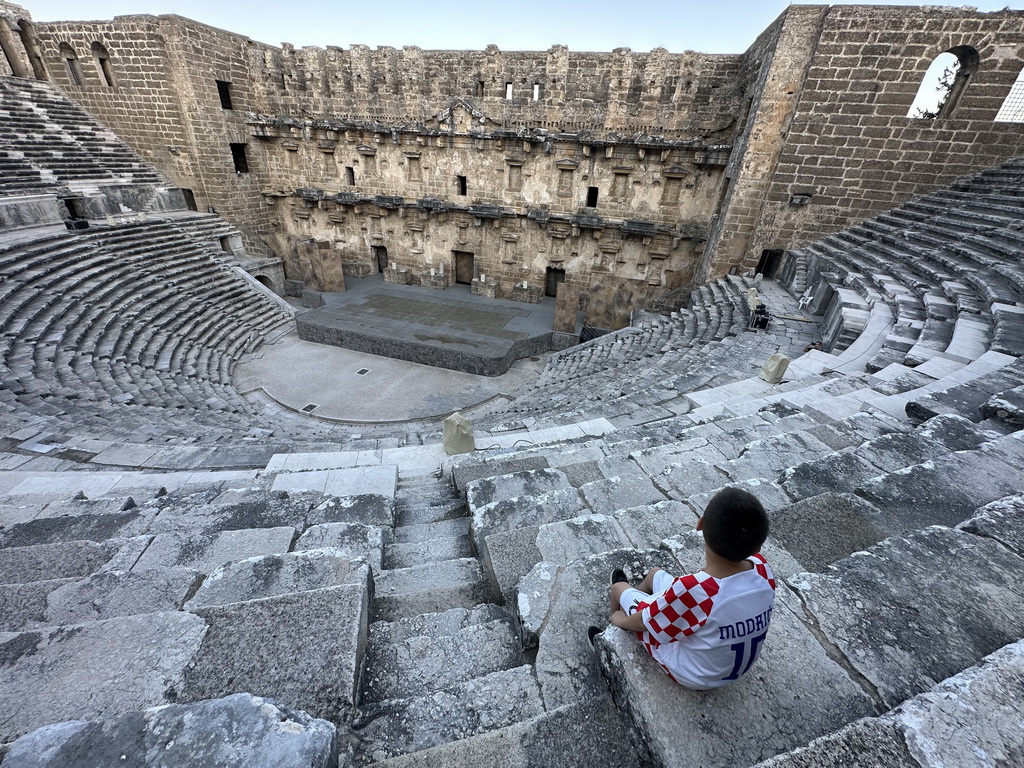 Max at the southwest auditorium of the Roman Theatre of Aspendos, with a view on the orchestra, stage and stage building