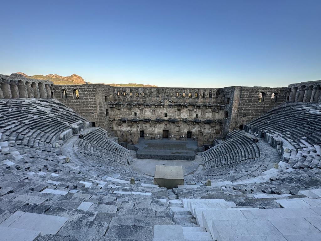 Auditorium, orchestra, stage and stage building of the Roman Theatre of Aspendos, viewed from the top of the west auditorium