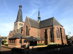 Southeast side of the St. Remigius Church with an information stand, viewed from the Singel street