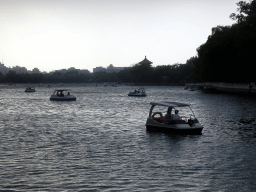 Boats on Houhai Lake and the pavilion at the Houhai Beiyan street, viewed from the Houhai Nanyan street