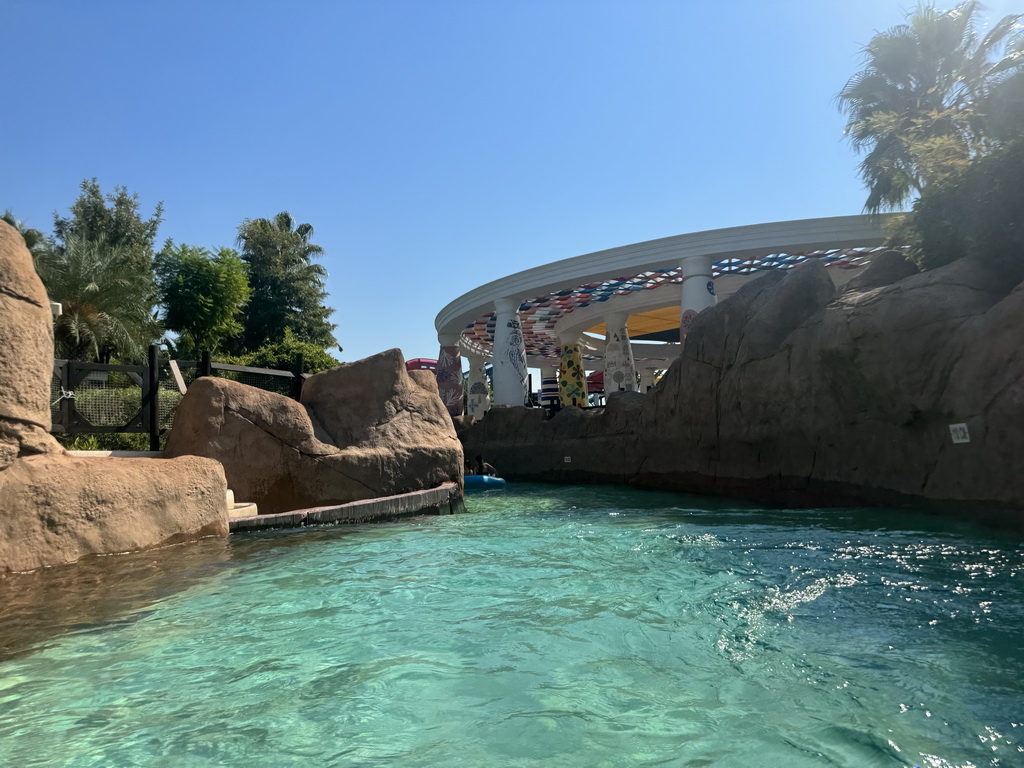 The Wild River attraction and the Round the World restaurant at the Aqua Land area of the Land of Legends theme park, viewed from a tube