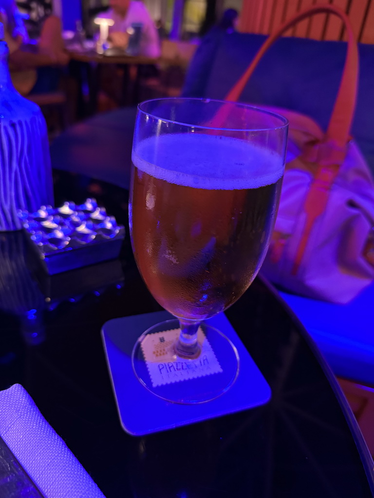 Beer at the terrace of the Piazzetta Italiana restaurant at the Shopping Avenue area of the Land of Legends theme park, at sunset