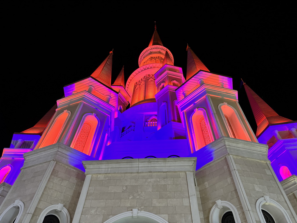 Facade of the Chateau at the Shopping Avenue area of the Land of Legends theme park, by night