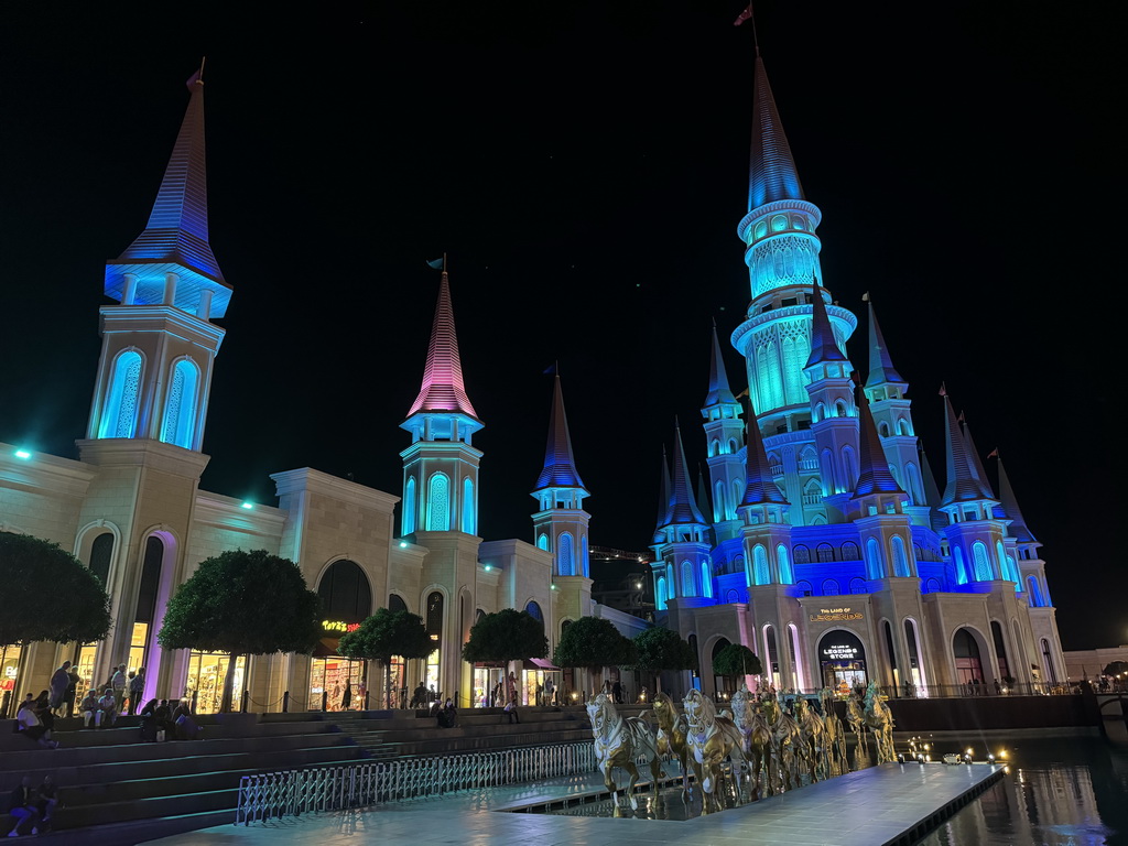 Horse statues in front of the Chateau at the Shopping Avenue area of the Land of Legends theme park, just before the Musical Boat Parade, by night