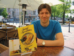 Tim on the terrace of a restaurant in the city center