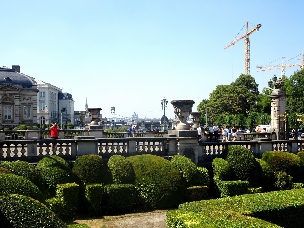 West side of the front garden of the Royal Palace of Brussels, and the Basilique du Sacré-Coeur de Bruxelles church