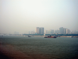 Xiangjiang river, boats and skyline of Chengsha, from Juzi Island