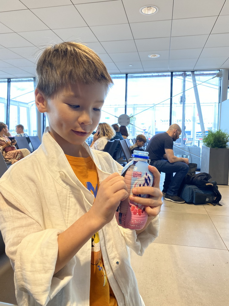 Max with a Fristi at the Departures Hall of the Rotterdam The Hague Airport