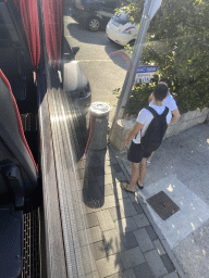 Car after hitting our tour bus to Perast on the Put od Cavtata street at Cavtat, viewed from the tour bus to Perast