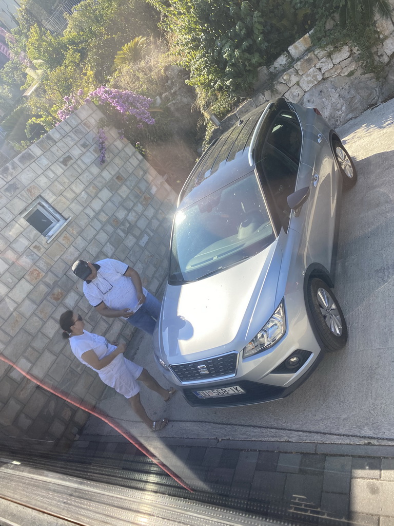 Car after hitting our tour bus to Perast on the Put od Cavtata street at Cavtat, viewed from the tour bus to Perast