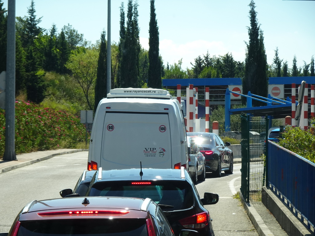 Cars waiting in line for the Croatia-Montenegro border crossing near the town of Plocice, viewed from the tour bus to Perast on the D8 road