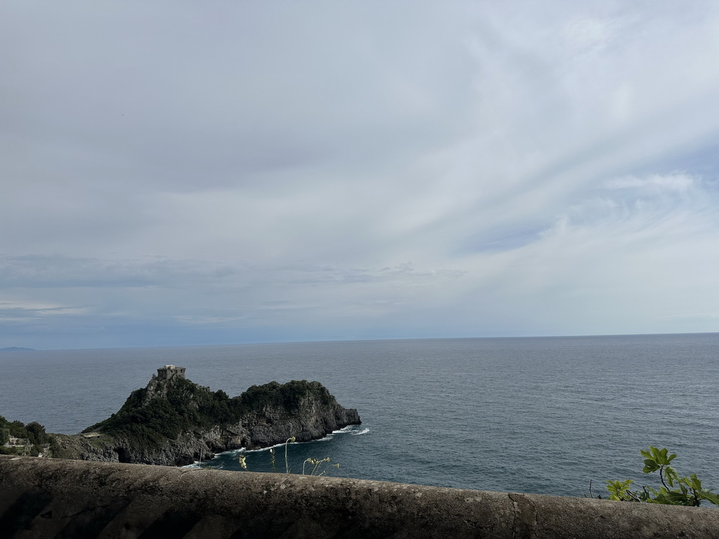 The Torre Capo di Conca tower and the Tyrrhenian Sea, viewed from the rental car on the Via Smeraldo road