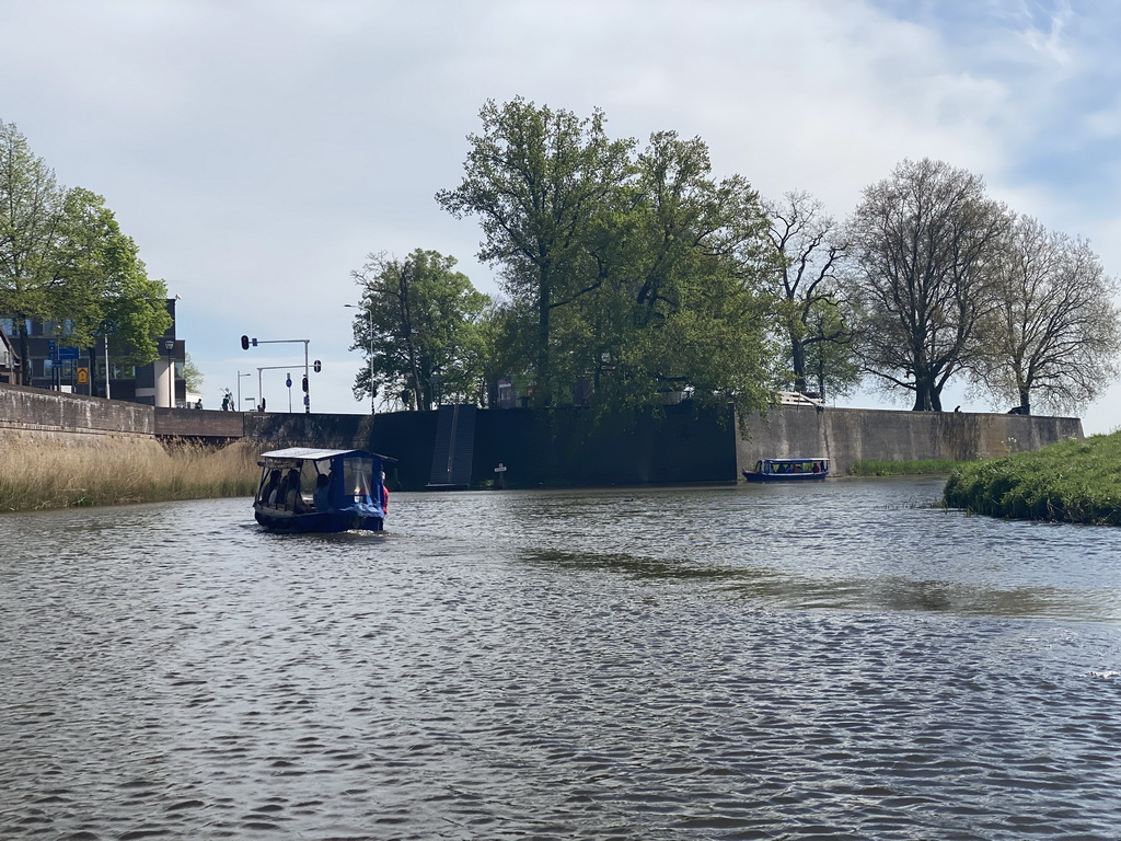 Boats on the Singelgracht canal and the Bastion Oranje, viewed from the tour boat