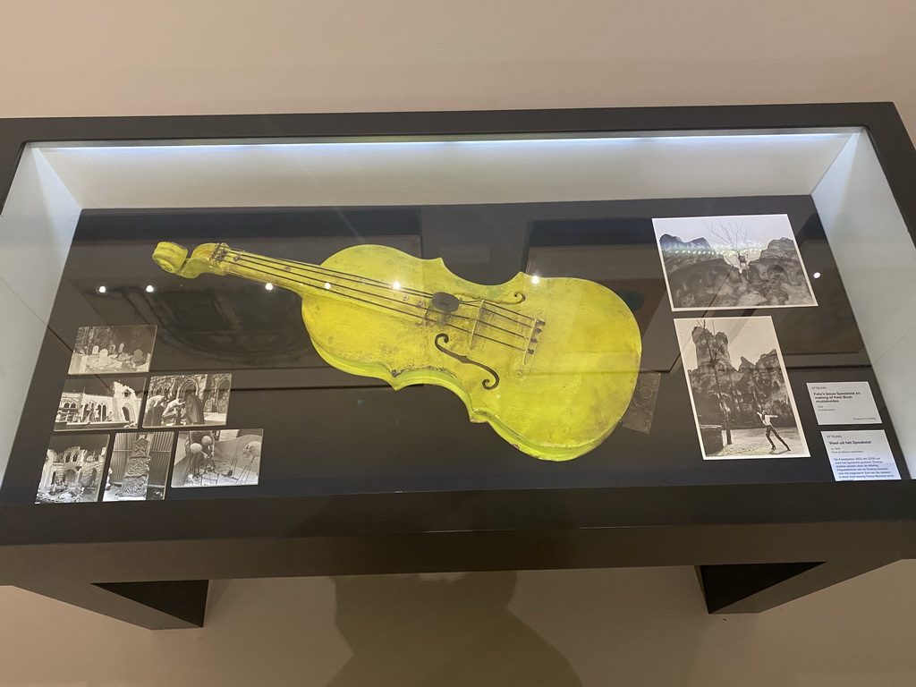 Violin and photographs of the construction and Kate Bush music video of the Spookslot attraction at the Efteling theme park, at the Efteling exhibition at the Noordbrabants Museum, with explanation