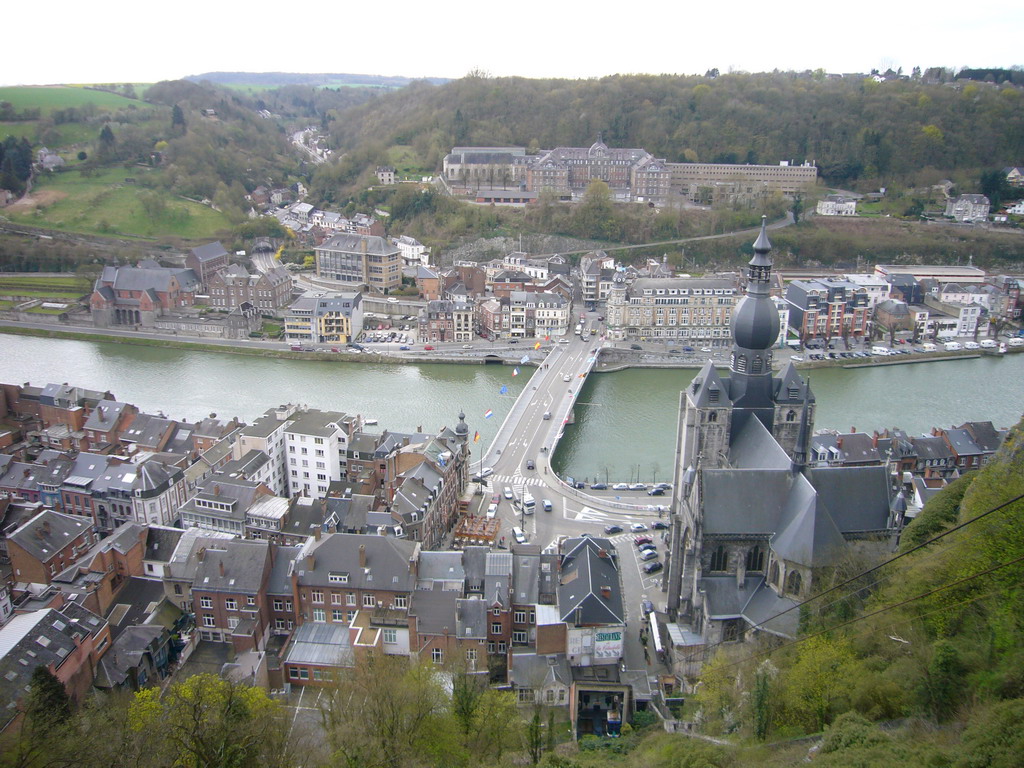 The city center with the tower of the Notre Dame de Dinant church, the Pont Charles de Gaulle bridge over the Meuse river and the Collège ND Bellevue school, viewed from the southeast part of the Citadel of Dinant