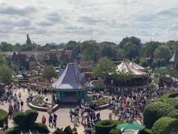 The La Petite Maison des Jouets store and the Dumbo the Flying Elephant attraction at Fantasyland at Disneyland Park, viewed from the Queen of Hearts` Castle at the Alice`s Curious Labyrinth attraction