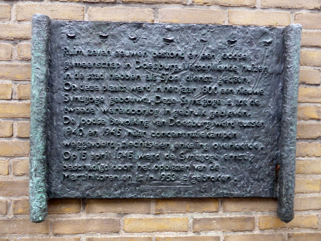 Inscription with information on a synagogue, at an alley inbetween the Markt square and the Veerpoortstraat street