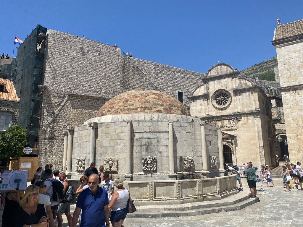 The Large Onofrio Fountain at the Poljana Paska Milicevica street and the Church of St. Salvation and the staircase to the city walls at the west side of the Stradun street