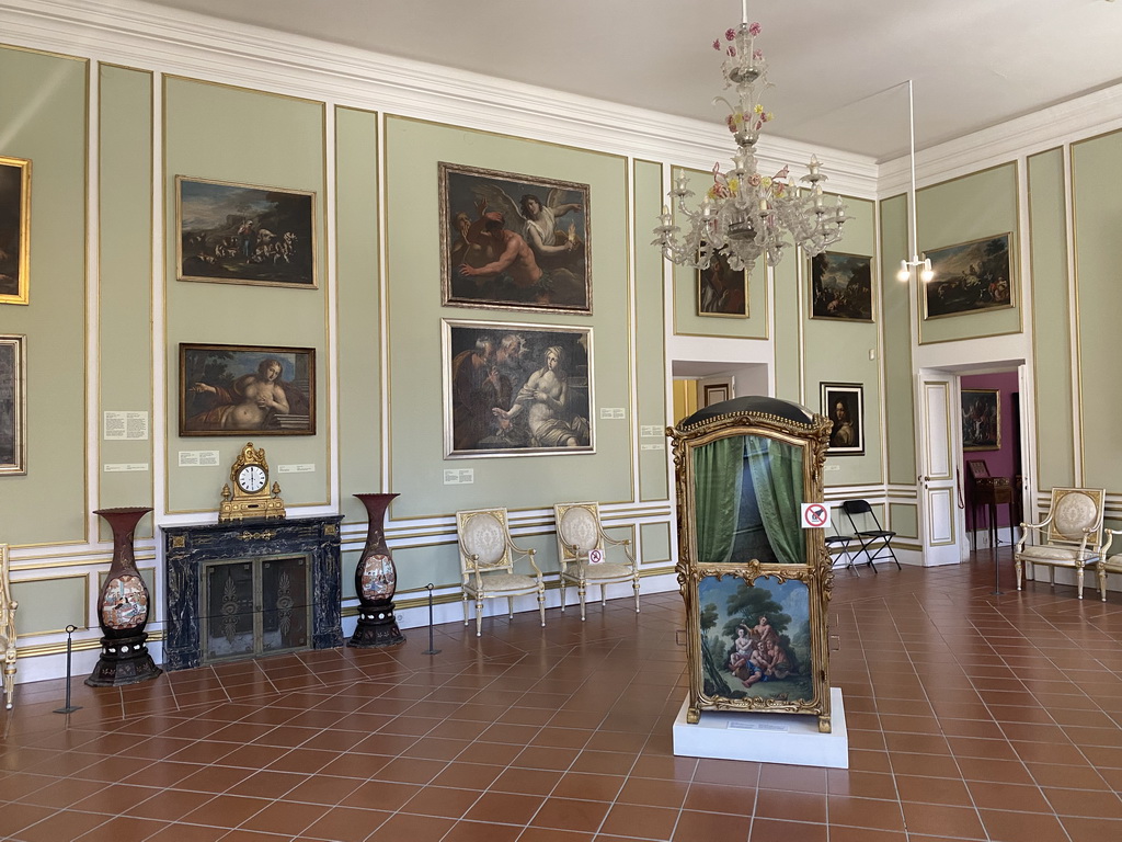 Carriage, vases, paintings and chairs at the upper floor of the Rector`s Palace