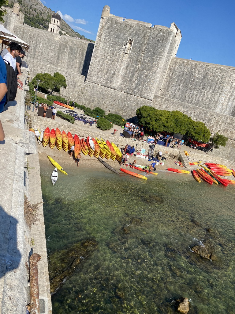 The western city walls, Kolorina Bay and kayaks at Bokar Beach, viewed from the viewing point at the Brsalje Ulica street