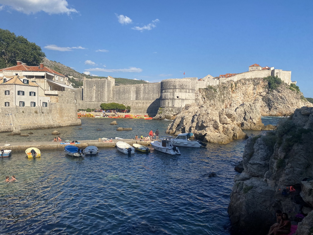 Pier and boats at the Dubrovnik West Harbour, the Tvrdava Bokar fortress, Kolorina Bay and kayaks at Bokar Beach