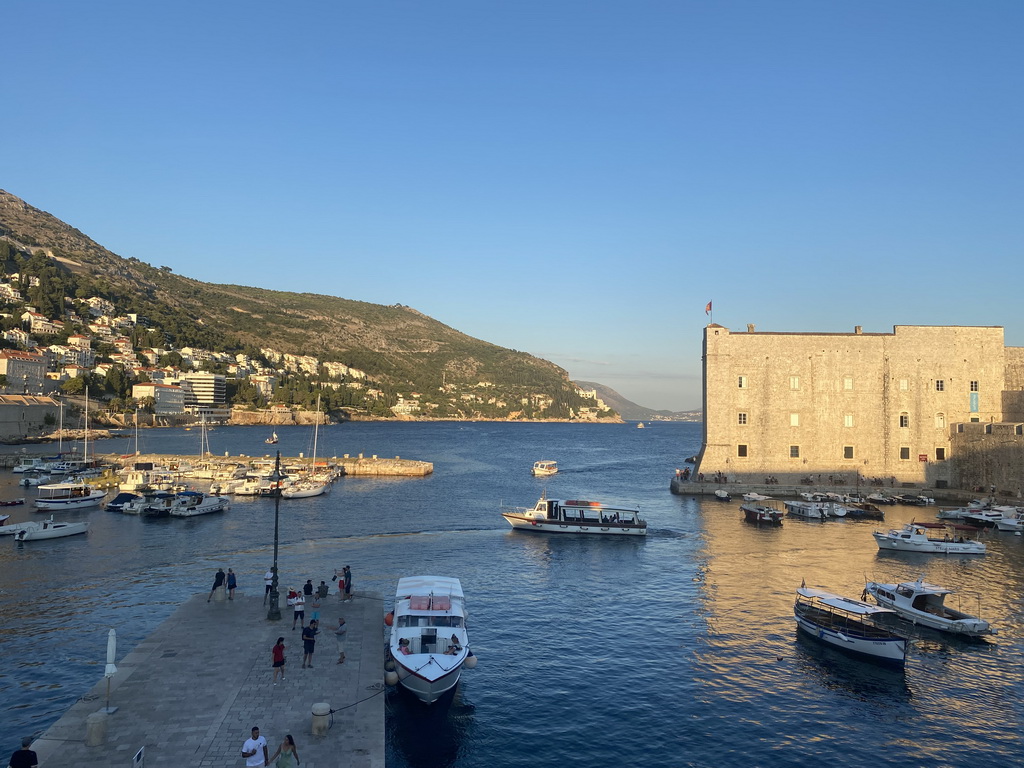 The Old Port, the Tvrdava Svetog Ivana fortress and the east side of the city with the Lazareti Creative Hub of Dubrovnik, the Plaa Banje beach and the Hotel Excelsior, viewed from the top of the eastern city walls