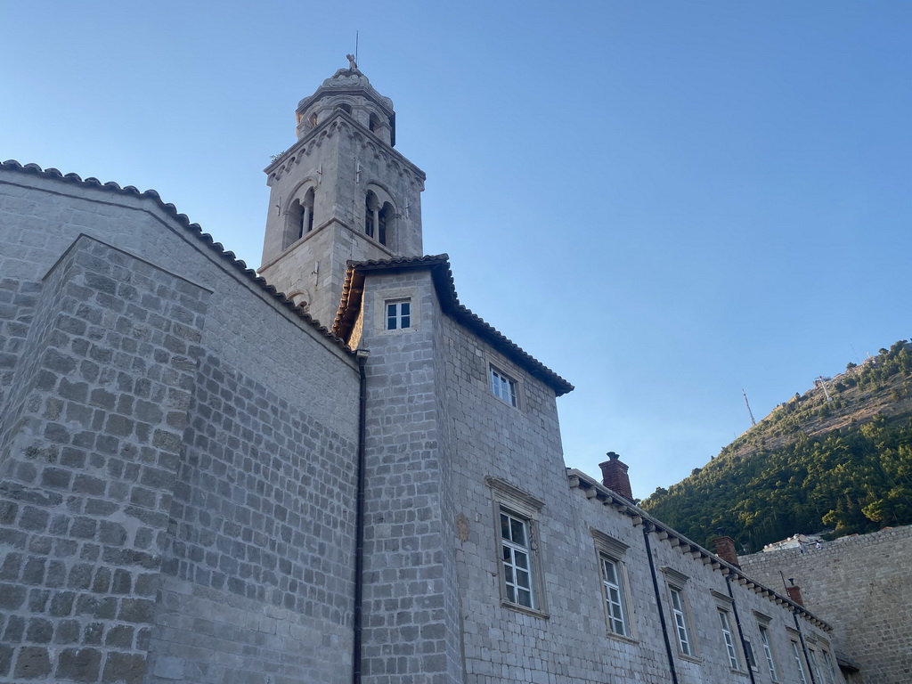 The east side and tower of the Dominican Monastery and Mount Srd, viewed from the top of the northeastern city walls