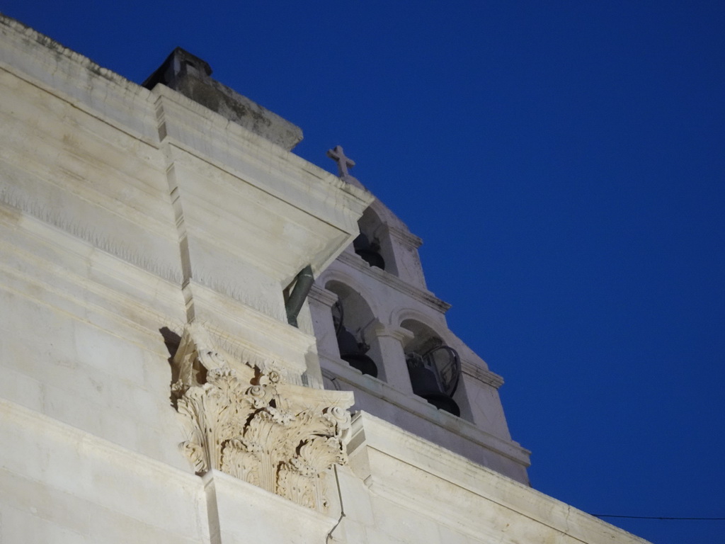 Southwest facade of St. Blaise`s Church at the Zeljarica Ulica street, viewed from the terrace of the Konoba Saint Blaise restaurant, at sunset