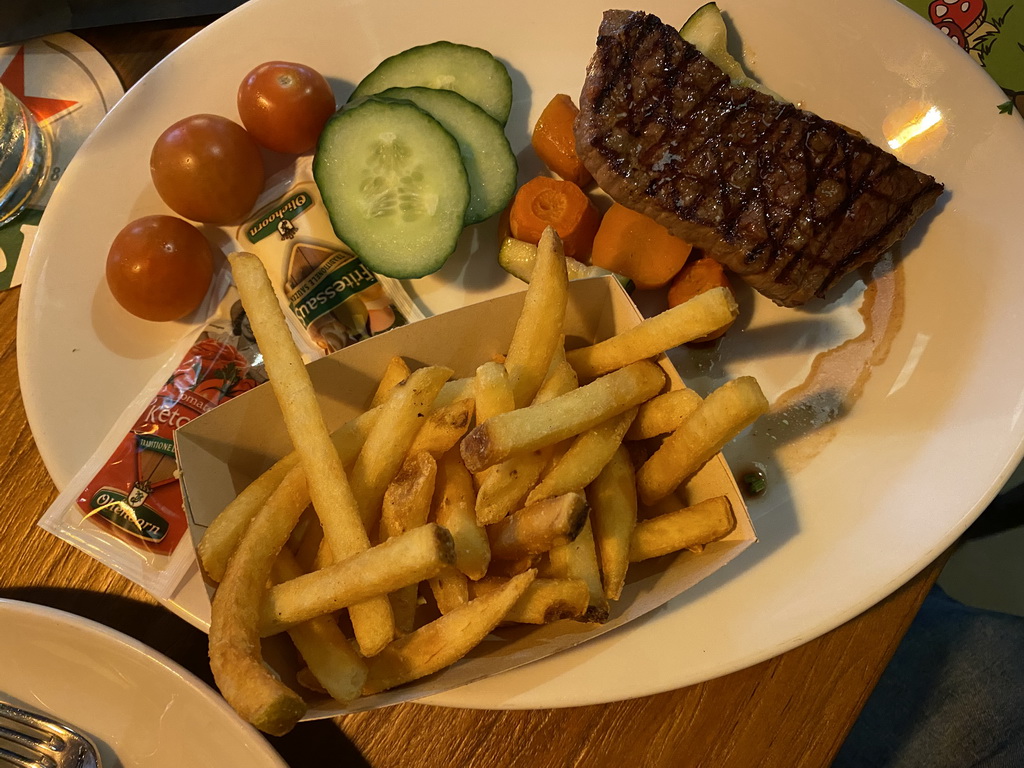 Steak with fries and vegetables at the Brasserie restaurant at the Landal Coldenhove holiday park