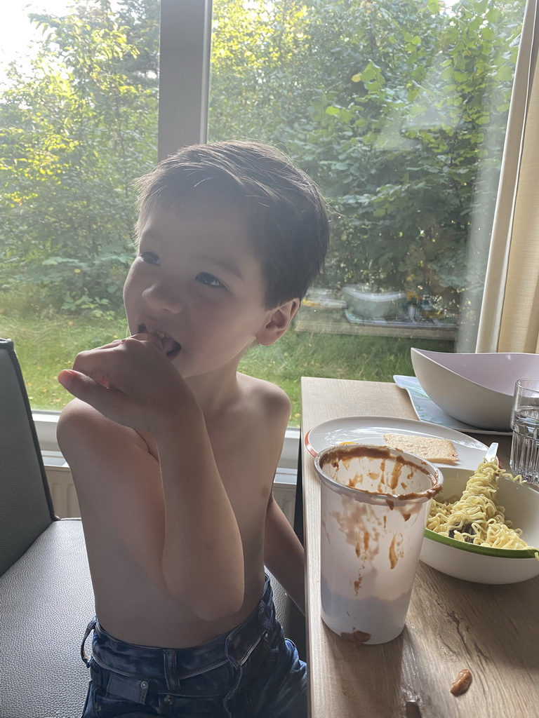 Max having dinner in the living room of our holiday home at the Landal Coldenhove holiday park