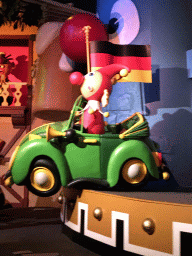 Jokie in a car at the German scene at the Carnaval Festival attraction at the Reizenrijk kingdom