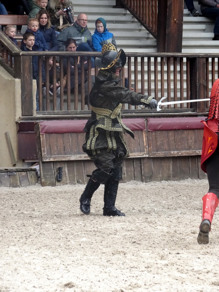 Actors on the stage of the Raveleijn theatre at the Marerijk kingdom, during the Raveleijn Parkshow, viewed from the Wapen van Raveleijn restaurant