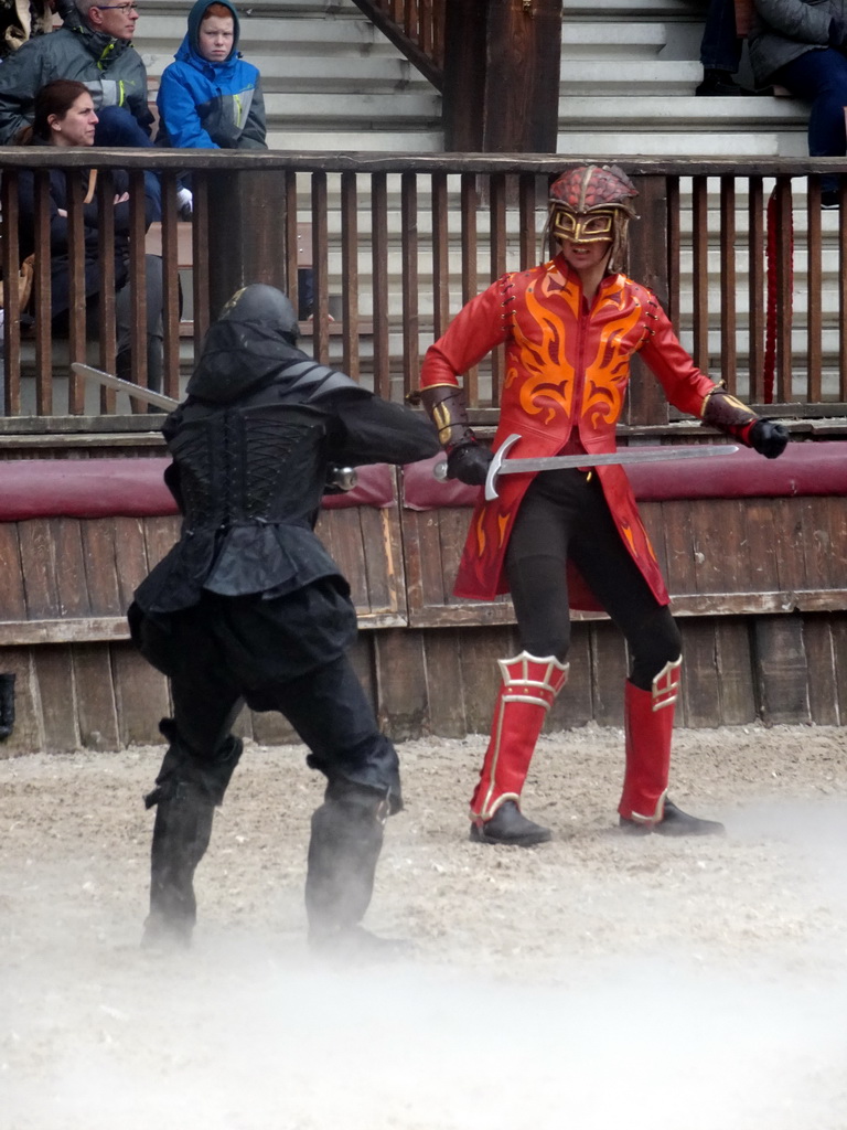 Actors on the stage of the Raveleijn theatre at the Marerijk kingdom, during the Raveleijn Parkshow, viewed from the Wapen van Raveleijn restaurant