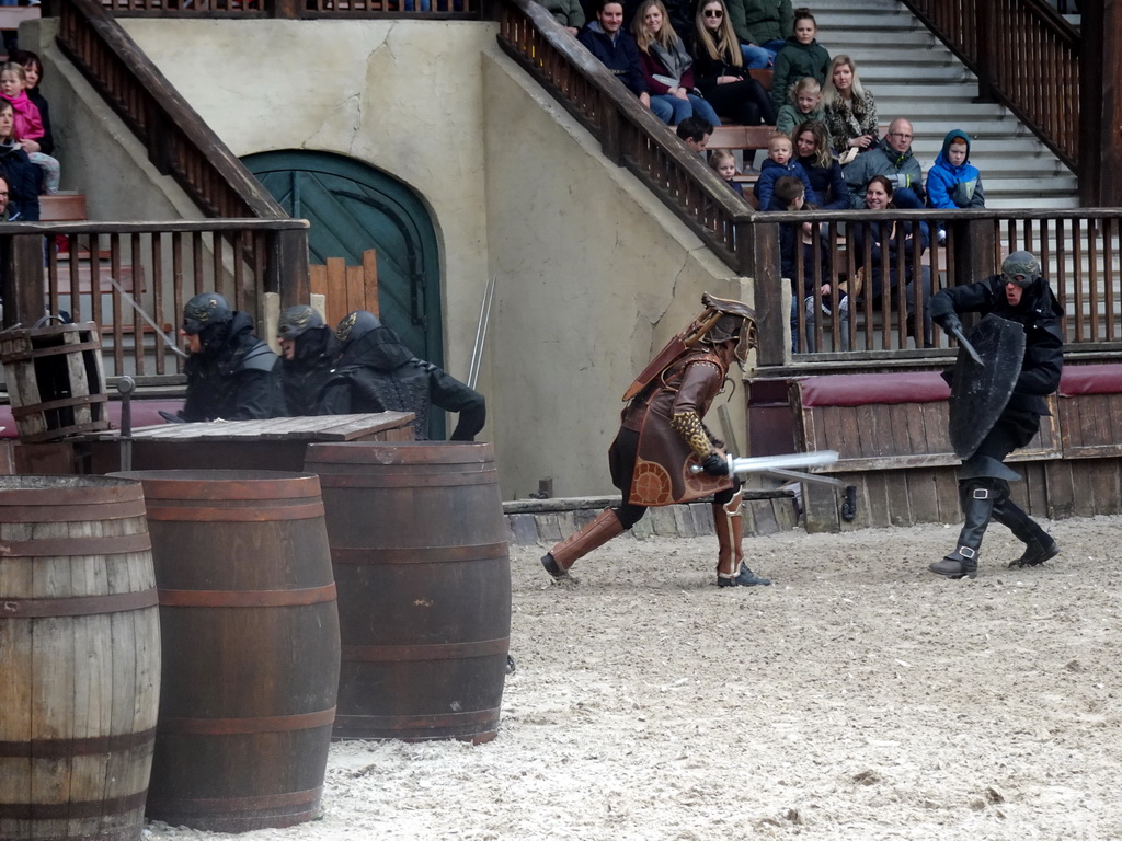 Actors on the stage of the Raveleijn theatre at the Marerijk kingdom, during the Raveleijn Parkshow, viewed from the Wapen van Raveleijn restaurant