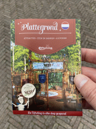 Front of the map of the Efteling theme park with a photograph of the Nest! play forest