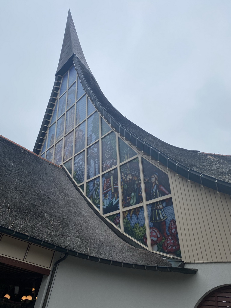 `Stained glass` drawings at the back side of the House of the Five Senses, the entrance to the Efteling theme park