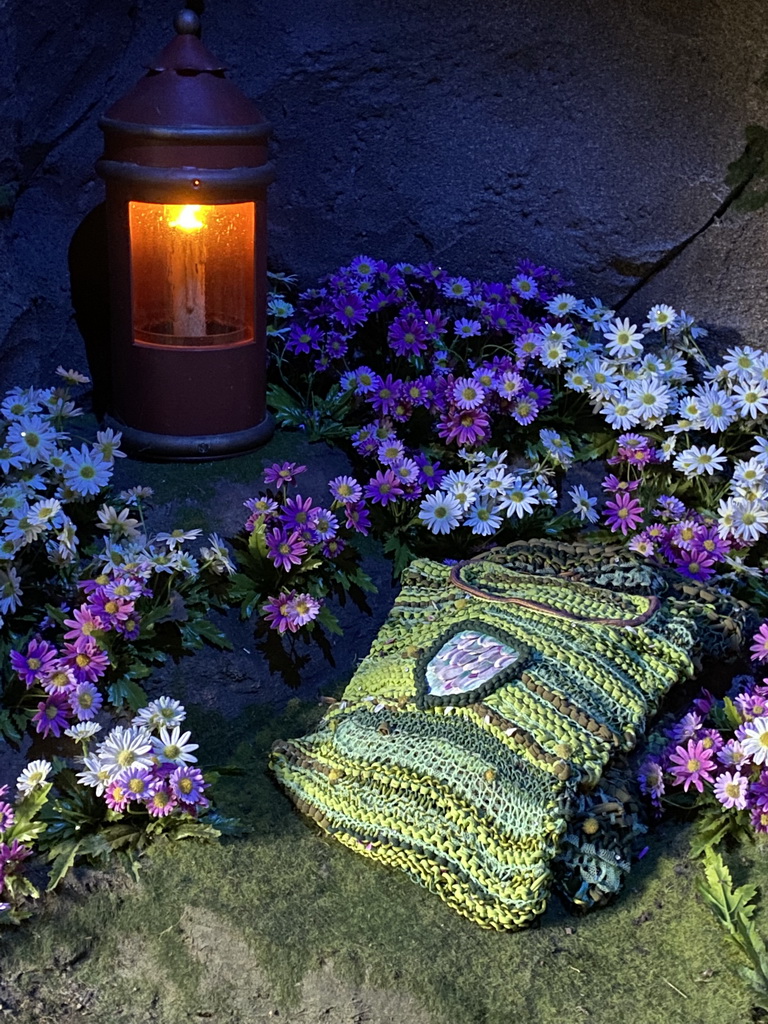 Sweaters and lamp at the Six Swans attraction at the Fairytale Forest at the Marerijk kingdom, viewed from one of the boats