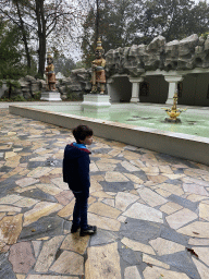 Max with the statues in front of the Indian Water Lilies attraction at the Fairytale Forest at the Marerijk kingdom