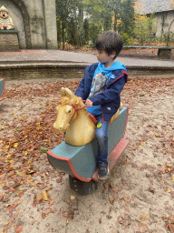 Max on a seesaw at the Kindervreugd playground at the Marerijk kingdom