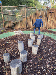 Max on stepping stones at the Nest! play forest at the Ruigrijk kingdom